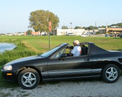 My navigator and fellow photographer for the day, also known as Dad. It's getting late in the day, and his back is bugging him, so he's just shooting from the car. I promise, the "hat on backwards while shooting" is a bad habit he picked up from me - he's not trying to be cool.