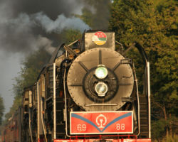 Quite possibly my favorite shot from the whole trip - 6988 coming through the tree tunnel just before Moline's 41st Street crossing