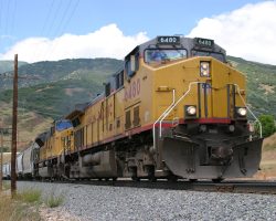 The train this time is lead by UP 6480, and consists of 50 loaded cars similar to the ASHX ones they use to haul soda ash and sodium bicarb out of Parachute.