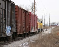 A mile or so south of the Lake McBride bridge, we bid CIC 107 north farewell for the day. While I followed it to Swisher, the light got nothing but worse.