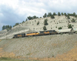 As the railway leaves the road-level grade to climb, we catch the rear pushers near Detour