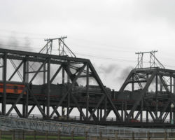 Back on IAIS rails, the two QJs head across the Mississippi to Rock Island via the Government Bridge (DJH Photo)