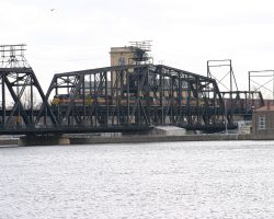 IAIS 625 leads BICB-29 across the swing span of the double deck Government Bridge over the Mississippi. The bridge links the Rock Island (IL) Arsenal (its own island) with Davenport, IA