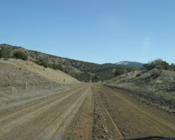 Beyond the bridge, the right of way has been turned into a dirt road until near Carracas.