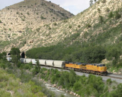 Further down the grade, we see UP 6480 emerging from one of the Nolan Tunnels