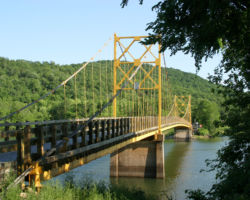 If you go to Eureka Springs, take 187 out of town and you'll find this great suspension bridge. This historic bridge on a secondary road is currently threatened by plans to replace it.