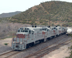 The four (202, 201, 205, 207) round the corner at the Kelvin Jct. yard. Note all the stored tankers