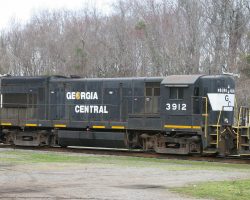 On the east end of the line in Savannah, GA, we find three more U23Bs putting together a westbound road freight.