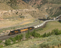 Our train curls around, past the generating station, and out of sight towards Helper