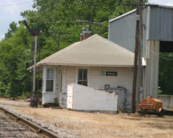 The Perry depot, complete with train order signal and "Bankruptcy Blue" Rock Island signboard