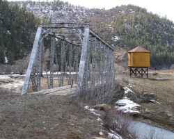 Beyond Juanita, it's seven miles to Navajo. However, the road is a muddy sinkhole, so I drove all the way around. At Navajo is a nicely preserved tank and another bridge.