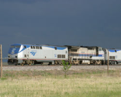 After driving through pounding rain and hail, we stopped at the rest area just south of Raton, only to be caught by the eastbound Southwest Chief on 30-May-2005