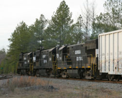 And into the yard at East Dublin... That's the branch to the papermill that you see splitting off to the left. Follow Hwy 199 south for about a mile and you'll see "Papermill Road" going to the right, which will take you right down to the plant.