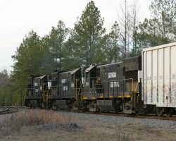 And into the yard at East Dublin... That's the branch to the papermill that you see splitting off to the left. Follow Hwy 199 south for about a mile and you'll see "Papermill Road" going to the right, which will take you right down to the plant.