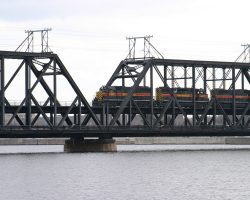 The Government Bridge is a double decker, with car traffic on the bottom. This is apparent as 625 and the BICB-29 runs atop a few cars mid-river.