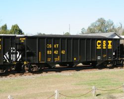 Probably about half of this train consisted of these freshly painted 70-ton hoppers. These things look *good*.