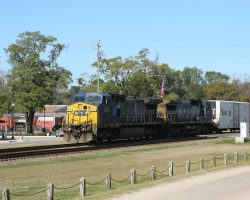Here comes another hot freight with CSXT 9006 up front. The train is mostly stacks, but up front are a few returning Tropicana refrigerated cars.