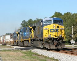 After the CNs, I finally decide to get off my butt and switch sides. I didn't get much of a break between trains - this is Q121 with CSXT 635, 7327, and 7553 in the lead. The signals in the background control the double track junction that brings together the lines from Waycross and Jesup.