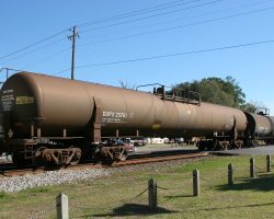 You don't see many of these - four truck (eight axle) tank cars. Big tankers are one of my favorite freight car oddities - learn all about them on Mike Palmieri's RailWhales site.