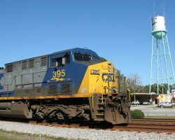 395 passes the Folkston watertower, proclaming its claim to fame as the "Gateway to the Okefenokee". They're really going to have to add "Railfan Mecca of the Southeast".