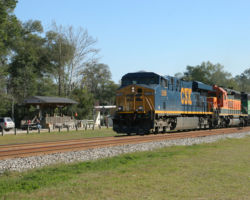One last shot of the northbound passing the platform in the background.