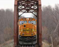 The rear DPU starts onto the Kiamichi River bridge near Fort Towsen