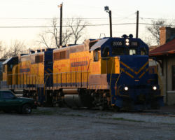 The crew backs the power into the small yard off the wye and pulls out a few yards