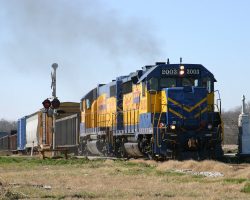 This train is climbing up out of the river valley in Fort Worth. In another half mile, it'll be in the FWWR yard under I-35W.