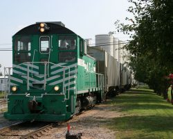 Between Watonga, OK, and UP's El Reno, OK, yard exists the AT&L. They're primarily an agricultural hauler, as evidenced by the grain cars ATLT 1127 is shoving around at Watonga on 10-Sep-2005