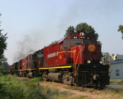 First sighting - the Monett Turn is about to depart Springdale with eight motors on the front - 44, 66, 58, 48, OHCR 3567, OHCR 3553, 62, and 68