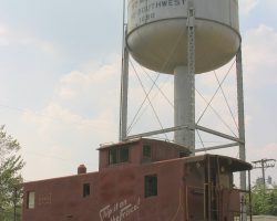 This old Frisco caboose and old watertower are on display in Granby, MO, on the BNSF main just west of Monett