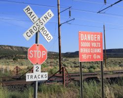 No doubt we're at the right place. Each crossing has these 50kV warning signs, as if you hit that wire (or even get within a few inches) it's going to be a hell of a bang.