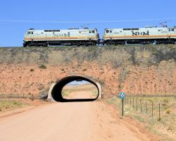 After passing Cow Springs and going over the only notable structure on the line - the bridge over Sour Water Wash - the line leaves US 160 to start climbing over the divide towards Page.