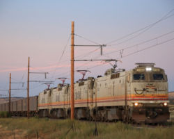 A railfan's luck - just as the sun drops below the horizon, the crew is finally ready to head out.  As seen at around milepost 76 or so, just west of the mine loadout.