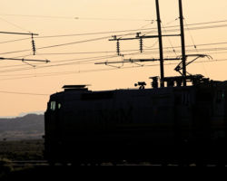 A late evening silhouette as the crew waits to depart the loadout.