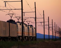 The Saturday afternoon run heads into the sunset and will arrive back at the plant in about two hours, well after dark. A forest fire down by the Grand Canyon adds some nice color to the evening glow.
