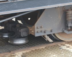 On one end of the Snaefell tram trucks are a set of guide wheels. These grip the Fell rail, holding the truck to the tracks and keeping everything aligned properly.