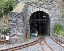 The only active rail tunnel on the island is right here, carrying the mine railway beneath the highway and the Manx Electric. It's also now used as secure equipment storage for the restored line.