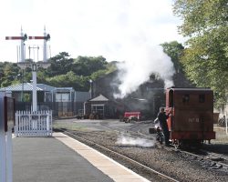 #8 out and running around the Douglas yard. The railway shops are just ahead and to the right.