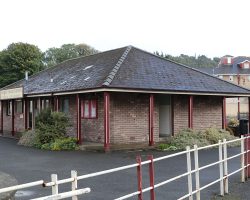 The old Ramsey tram station, which is no longer connected to the tram system. The end of the line is marked by a catenary pole that can barely be seen in the middle left edge of the shot.