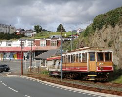Between Derby Castle (Douglas) and Laxey, the road and railway are frequently right next to each other. Here's #22 and trailer just out of Derby.