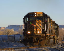 First light shines on DRGW 3129 southbound at Whitewater, CO