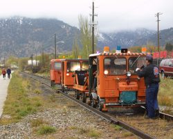 Getting ready for the 0900h run, three of the four motorcars, along with the two trailers, are sitting on the branch at Glenwood Springs, CO.