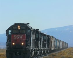 From just west of Blanca to east of Alamosa (El Rancho Lane), the tracks are easily followed by a closely-paralleling dirt road called 124. The line is easily followed and shot from this road, even if the sun is in entirely the wrong place for morning photography.