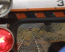 Looking forwards through the windshield of our car at the leading ex-CN car.