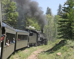 There's only so much you can do photographically as a passenger on a train - I apologize for all the "train on a curve" shots, but it gives those who've never seen it in person an idea of what we're passing through. Here we rounding a curve just below Lobato.