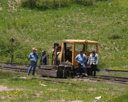 Here's our fire protection crew, riding in speeder 012 and wondering what the heck is taking us so long to pick up four cars at Cumbres.