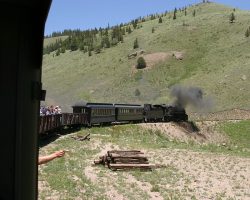 East of the Los Pinos valley lies the approach to the Toltec Gorge, marked by the river steadily dropping away from the railway into an ever-deepening canyon below. As such, the railway crosses two large side drainages created by streams headed for the river. The first of these (eastbound) is Long Creek, crossed by a culvert and fill on this curve.