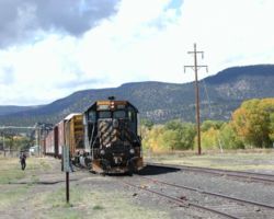 No, it's not from this trip, but from my trip during October of 2000, right before the sawmill closed up and rail service to South Fork, CO, ended for all practical purposes. Contrast this with the previous shot (taken opposite directions, but at the same siding). The sawdust loadout is now gone, the SP GE and other related D&RGRHF gear is new, but otherwise it remains much the same.