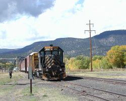 No, it's not from this trip, but from my trip during October of 2000, right before the sawmill closed up and rail service to South Fork, CO, ended for all practical purposes. Contrast this with the previous shot (taken opposite directions, but at the same siding). The sawdust loadout is now gone, the SP GE and other related D&RGRHF gear is new, but otherwise it remains much the same.